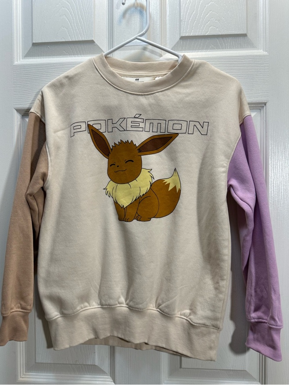 H&M Cream Pokémon Eevee Sweatshirt with Brown and Lilac Sleeves